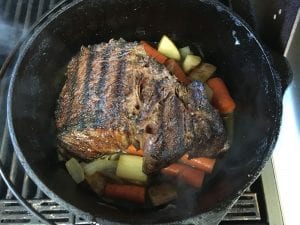vegetables on bottom to aid in cooking and breaking down startch